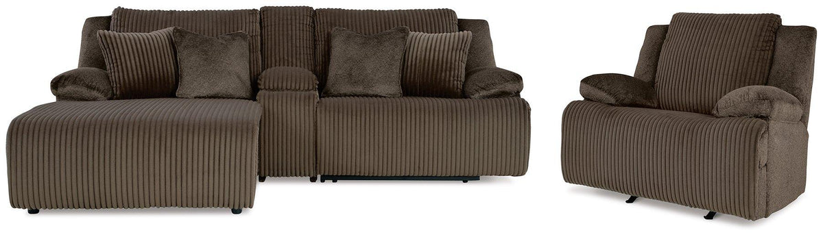 Ashley Furniture Top Tier living room set with sofa, armchairs, and coffee table arranged in a modern, stylish living space.