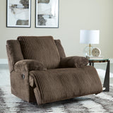 Ashley Furniture Top Tier living room set with plush sofas and armchairs, modern design, in a stylish living space.