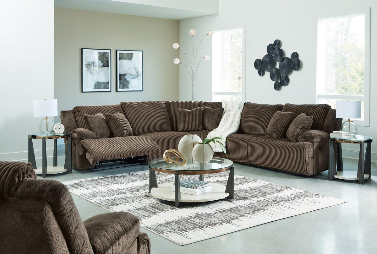 Ashley Furniture Top Tier living room set with a sofa and armchair, featuring neutral upholstery and modern design.