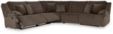 Ashley Furniture Top Tier living room set with sofa, loveseat, and armchair arranged in a modern, stylish living space.