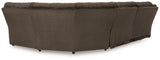 Ashley Furniture Top Tier living room set with sofa, armchairs, and coffee table arranged in a modern living space.