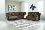 Ashley Furniture Top Tier living room set featuring a sofa, armchair, and coffee table in a modern design.