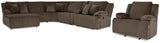 Ashley Furniture Top Tier living room set featuring a sofa and armchair with neutral upholstery and modern design.