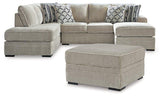 Ashley Furniture Calnita living room set featuring a sofa and loveseat with plush upholstery and modern design.