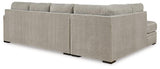 Ashley Furniture Calnita Living Room Set with plush sofas and coordinating coffee table, modern design for stylish living spaces.