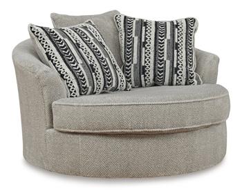 Ashley Calnita living room set featuring a sofa, loveseat, and armchair with neutral fabric upholstery and modern design.