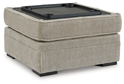 Ashley Furniture Calnita living room set featuring a sofa with built-in cup holders and plush cushions.