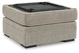 Ashley Furniture Calnita living room set featuring a sofa with built-in cup holders and plush cushions.