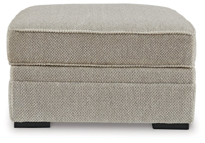 Ashley Furniture Calnita living room set featuring a sofa and loveseat with neutral upholstery and modern design.