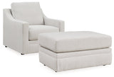 Ashley Furniture Maitelynn upholstery package with a stylish living room set including sofa and accent chairs, in a modern living space.