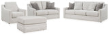 Ashley Furniture Maitelynn living room upholstery set with sofa, loveseat, and armchair in a modern design.