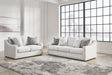 Ashley Furniture Maitelynn upholstery living room set with sofa and armchairs, featuring neutral fabric and modern design.