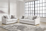 Ashley Furniture Maitelynn upholstery living room set with sofa and armchairs, featuring neutral fabric and modern design.