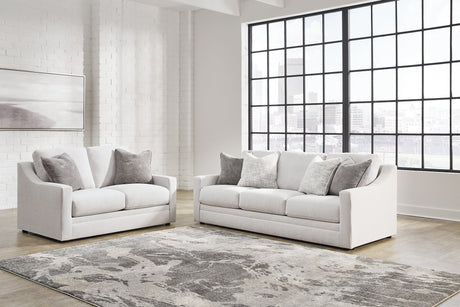 Ashley Furniture Maitelynn upholstery living room set with sofa and armchairs, featuring neutral fabric and modern design.