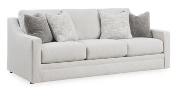 Ashley Furniture Maitelynn upholstery living room set with plush cushions and fabric upholstery, showcasing a stylish sofa and matching pieces.