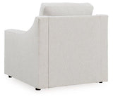 Ashley Furniture Maitelynn upholstery living room set with sofa and armchairs in a modern, cozy living space.