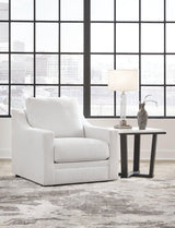 Ashley Furniture Maitelynn upholstery living room set with plush sofa and matching armchair in a modern design.