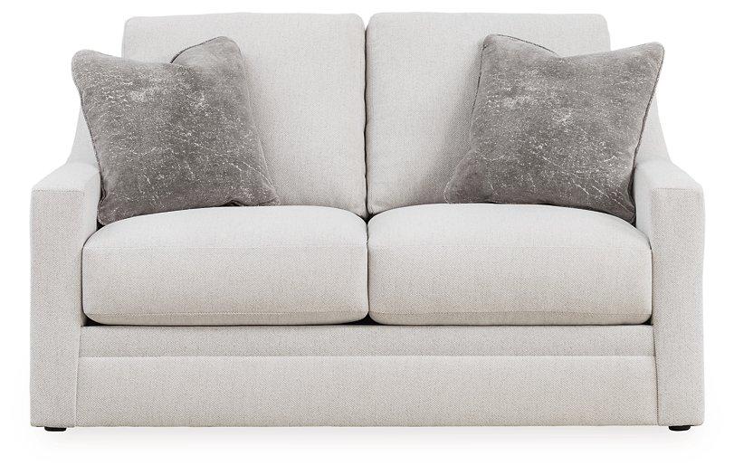 Ashley Furniture Maitelynn living room set upholstery package with sofa and armchair in a modern living room scene