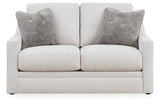 Ashley Furniture Maitelynn living room set upholstery package with sofa and armchair in a modern living room scene