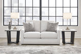 Ashley Furniture Maitelynn living room set upholstery package with sofa and armchair in neutral fabric, stylish and comfortable.