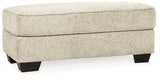 Ashley Furniture Monaghan Living Room Set with sofa and loveseat, featuring plush cushions and contemporary design.