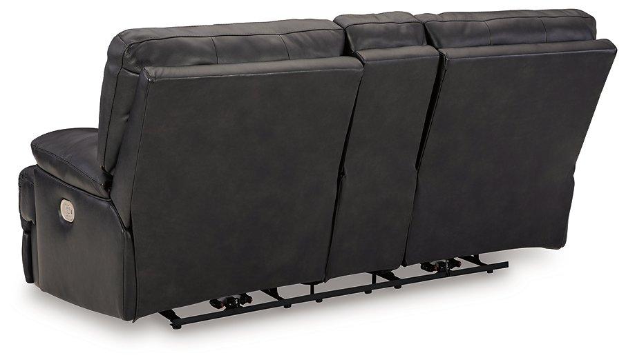 Ashley Furniture Mountainous Living Room Set featuring plush sofas and armchairs in a cozy, stylish living space.