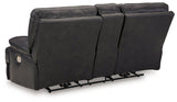 Ashley Furniture Mountainous Living Room Set featuring plush sofas and armchairs in a cozy, stylish living space.