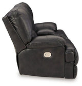 Ashley Furniture Mountainous Living Room Set featuring plush sofas and armchairs in a modern, cozy design.