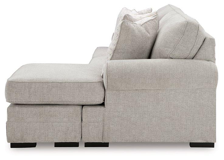 Ashley Furniture Eastonbridge living room set featuring a sofa, loveseat, and armchair with neutral upholstery and modern design.