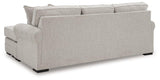 Ashley Furniture Eastonbridge living room set featuring a sofa, loveseat, and armchair with neutral upholstery and wooden legs.