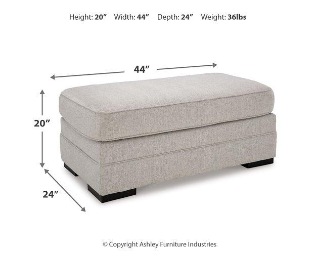 Ashley Furniture Eastonbridge living room set featuring a sofa and armchair with neutral upholstery and contemporary design.