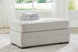 Ashley Furniture Eastonbridge living room set with sofa, loveseat, and armchair in a modern fabric, arranged in a cozy seating area.