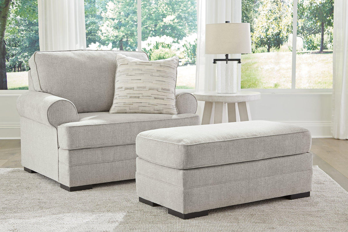 Ashley Furniture Eastonbridge living room set featuring a sofa and armchair with neutral upholstery and modern design.
