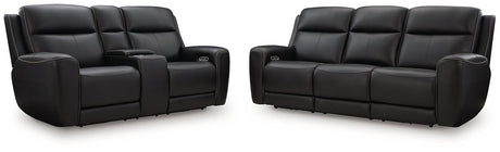 Ashley Furniture 5Z-Comfort Power Reclining Living Room Set with plush cushions and reclining features, shown in a modern living space.