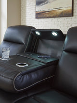 Ashley Furniture 5Z-Comfort Power Reclining Living Room Set featuring plush cushions and modern design in a cozy living space
