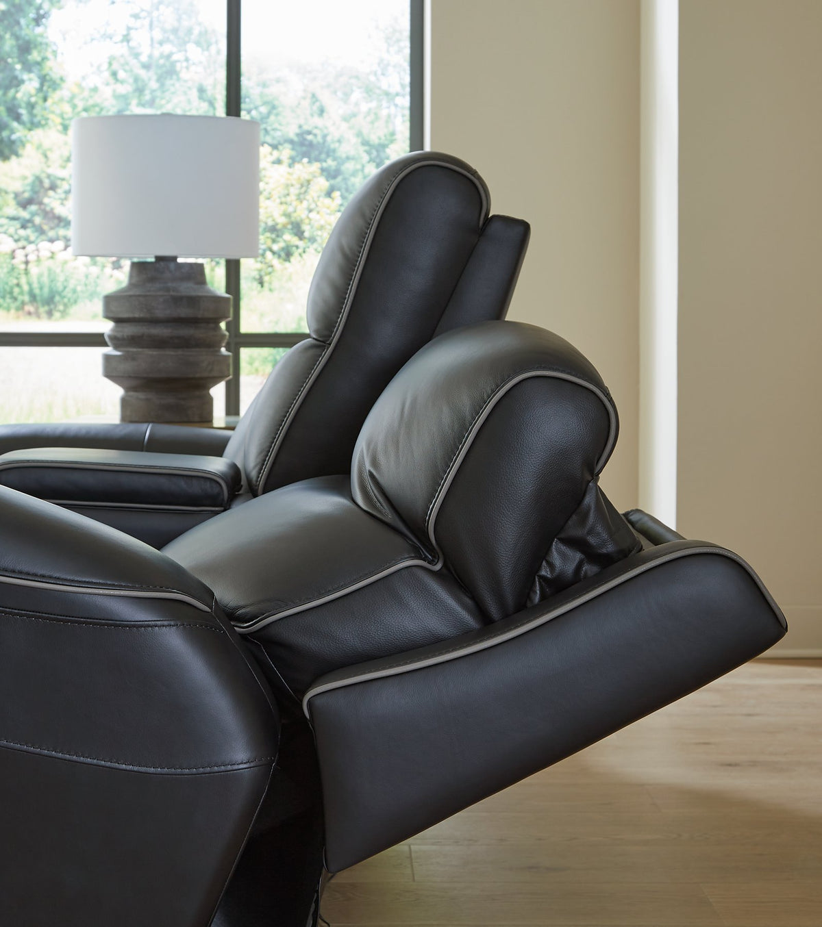 Ashley Furniture 5Z-Comfort Power Reclining Living Room Set featuring plush cushions and a modern design in a neutral fabric.