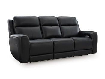 Ashley Furniture 5Z-Comfort Power Reclining Living Room Set with plush cushions and reclining seats, shown from an angled view.