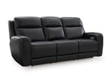 Ashley Furniture 5Z-Comfort Power Reclining Living Room Set with plush cushions and reclining seats, shown from an angled view.