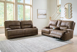 Ashley Furniture Beckley Place reclining living room set with sofa and loveseat, upholstered in neutral fabric.