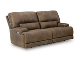 Ashley Furniture Beckley Place reclining living room set with sofa and loveseat, shown from an angled view, in a modern living room.