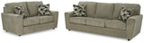 Ashley Furniture Cascilla living room set featuring a sofa and armchair with neutral upholstery and modern design.