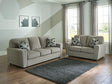 Ashley Furniture Cascilla living room set with sofa and armchair, featuring neutral upholstery and modern design.