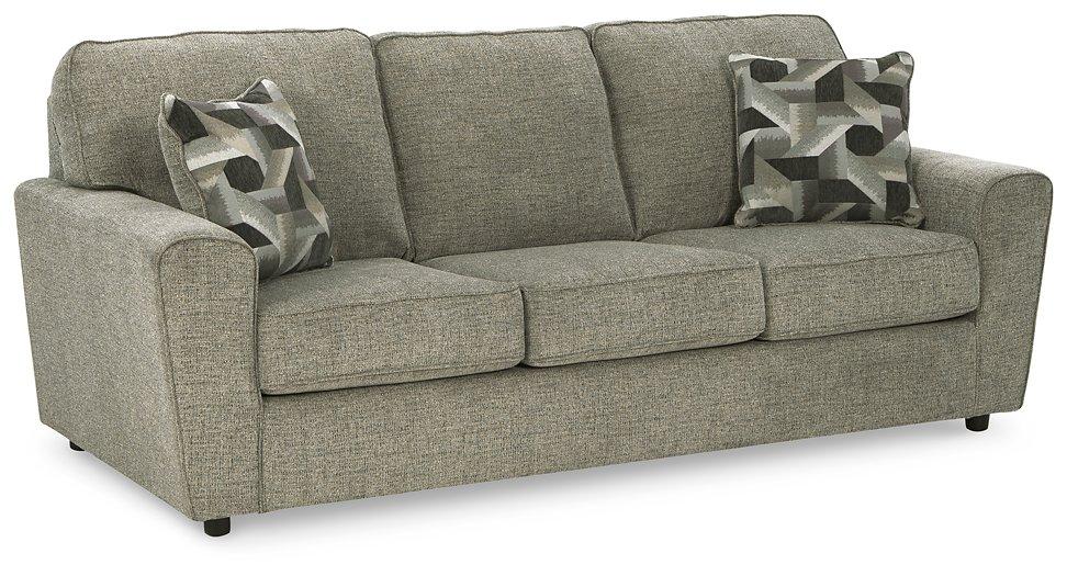 Ashley Furniture Cascilla living room set with plush sofa and matching armchair in a modern, comfortable design.