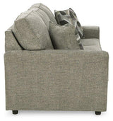 Ashley Furniture Cascilla living room set with a sofa and armchair in a modern design, featuring neutral upholstery.