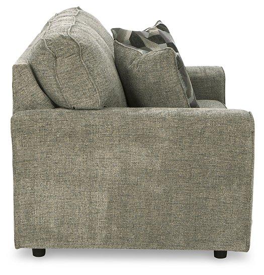 Ashley Cascilla living room set with a sofa, loveseat, and armchair in a modern fabric, arranged in a cozy seating area.