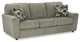 Ashley Cascilla living room set with a plush sofa and matching armchair in a modern design, featuring neutral fabric and stylish cushions.