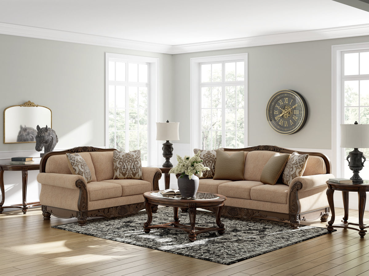 Ashley Furniture Chelsworth Living Room Set featuring a plush sofa and loveseat with neutral upholstery and modern design.