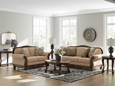 Ashley Furniture Chelsworth Living Room Set featuring a plush sofa and loveseat with neutral upholstery and modern design.