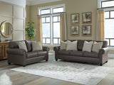 Ashley Furniture Roxmere living room set featuring a sofa and loveseat with neutral upholstery and modern design.
