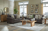 Ashley Furniture Roxmere living room set featuring a sofa, loveseat, and matching chairs with neutral upholstery and modern design.